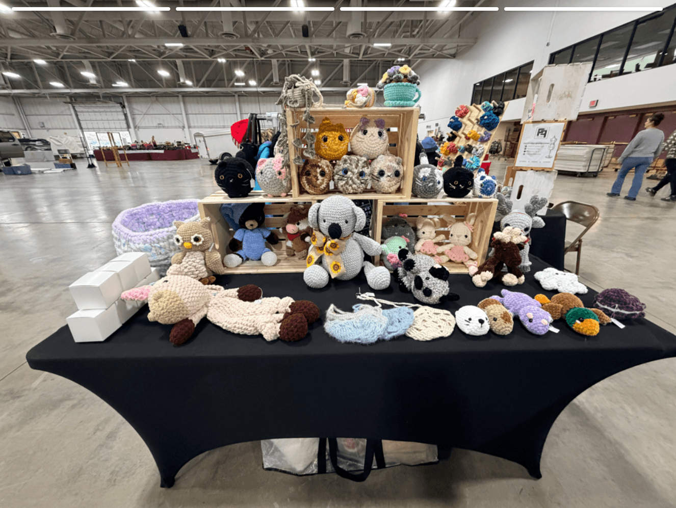 Rustic Crochet booth display at a craft fair